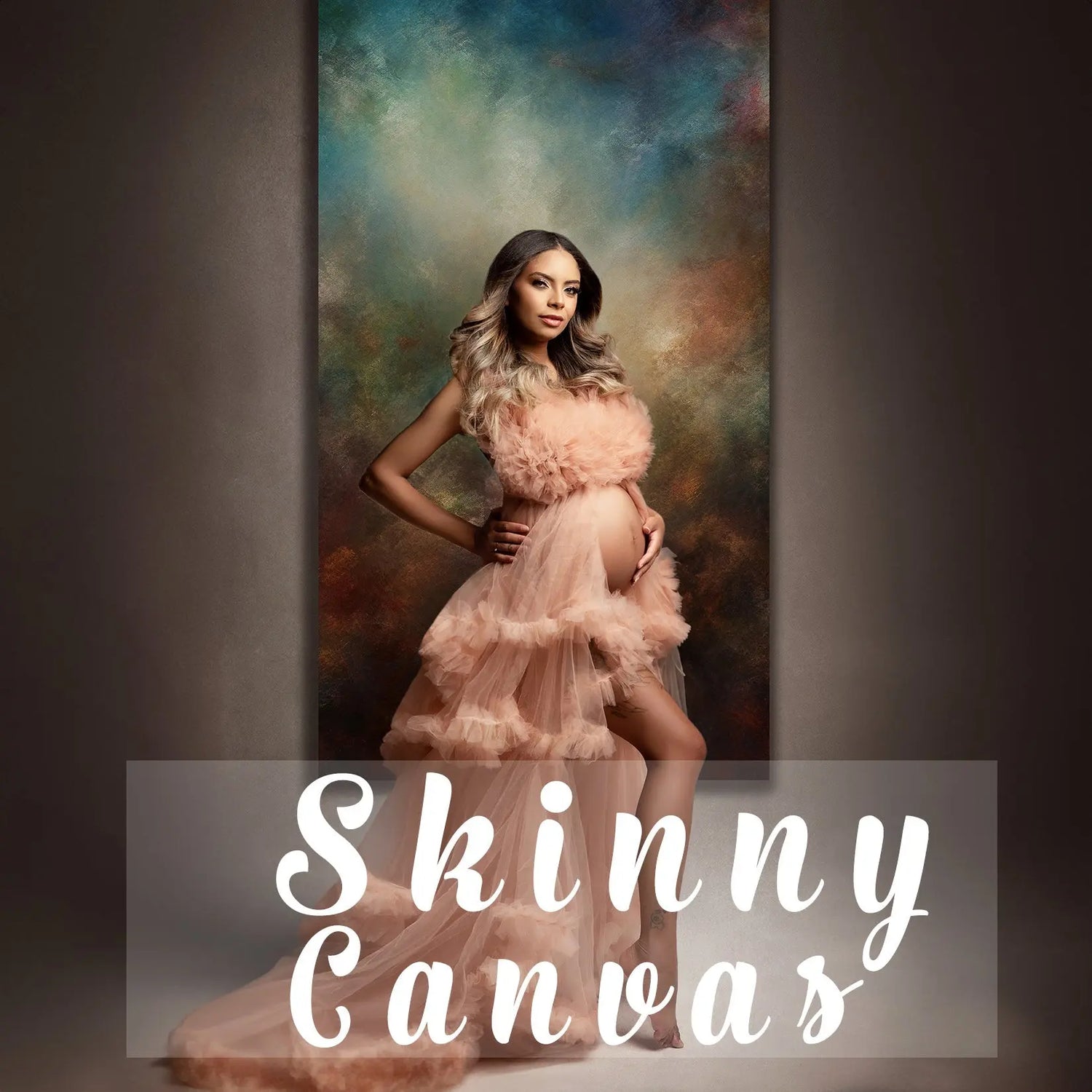 Pregnant woman in peach tulle gown posing in front of artistic skinny canvas backdrop – luxury maternity photo background